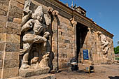 The great Chola temples of Tamil Nadu - The Brihadisvara temple of Gangaikondacholapuram. Huge monolith dvarapala guarding the entrance of the temple. 